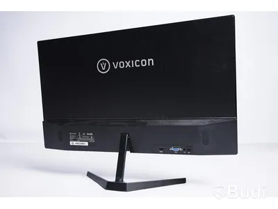 Datorskärm Voxicon D24FO med tangentbord och HDMI kabel.