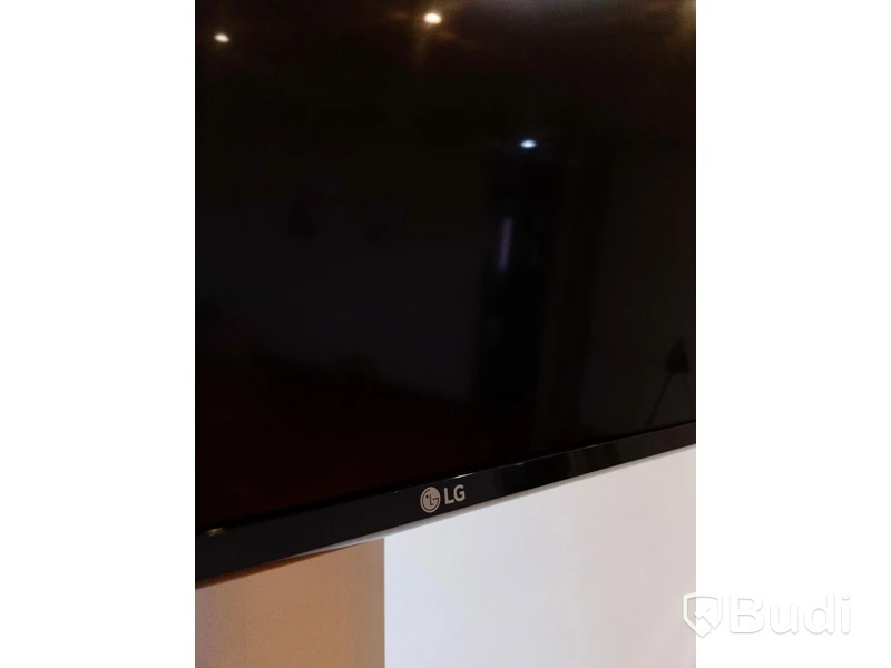 Tv LG 49UJ630V inklusive rullbart ställ & fjärrkontroll
