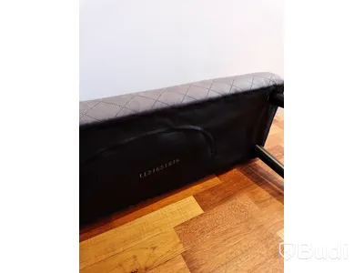 Bänk med textilklädsel