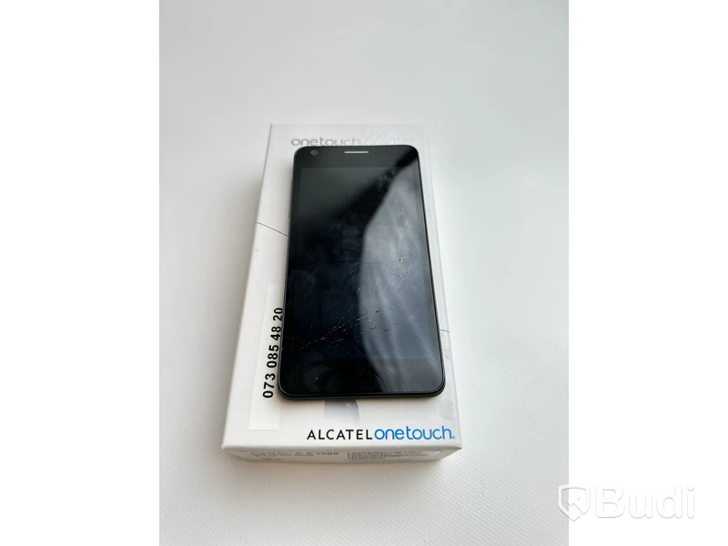 Mobil Alcatel Onetouch idol Ultra 16GB med originalförpackning. OBS! Sprucken skärm.
