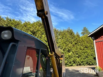 Kompaktlastare Gehl 6640 Turbo med redskap.
