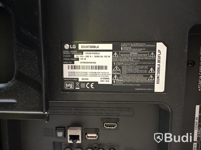 LG 65UN73006LA 65 tums tv med väggstativ och fjärrkontroll