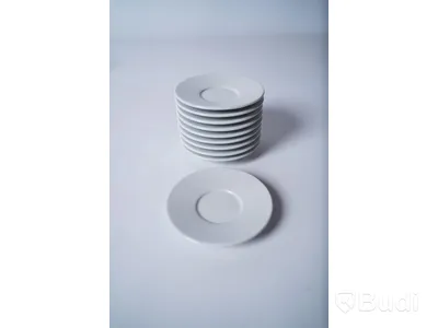 Diverse kaffekoppar med fat