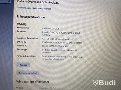 Kontorsarbetsplats med bärbar dator & monitor