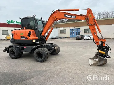 Hjulgrävare Doosan DX55W -2015 med tiltrotator, skopor & tjälkrok.