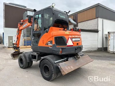 Hjulgrävare Doosan DX55W -2015 med tiltrotator, skopor & tjälkrok.