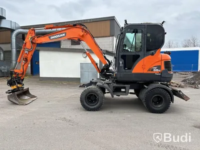 Hjulgrävare Doosan DX55W -2015 med tiltrotator, skopor & tjälkrok.