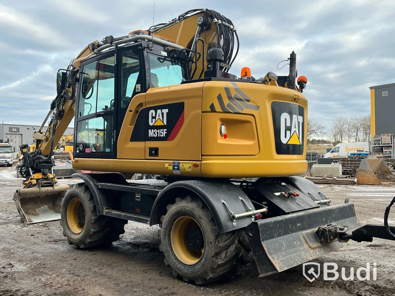 Hjulgrävare CAT M315F -2018 med Palmse trailer 2015
