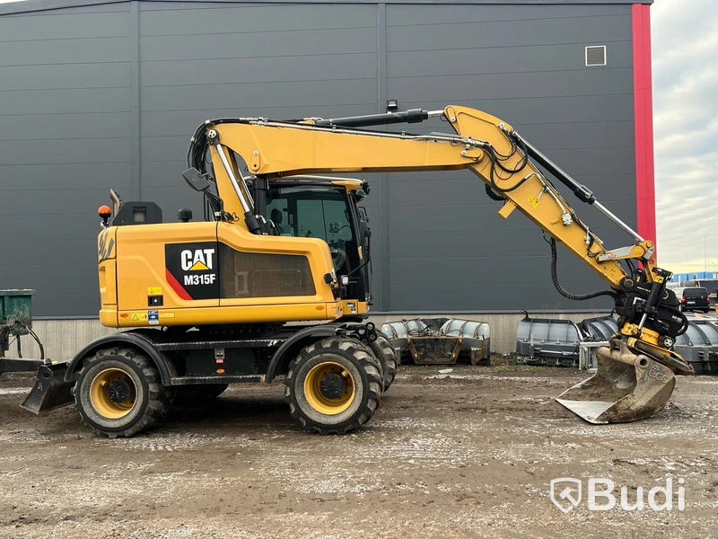 Hjulgrävare CAT M315F -2018 med Palmse trailer 2015