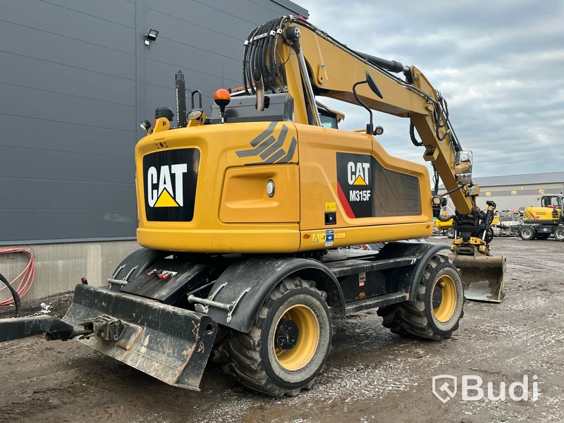 Hjulgrävare CAT M315F -2018 med Palmse trailer 2015