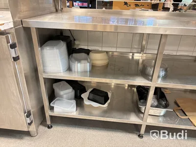 Rostfri arbetsbänk med två underhyllor