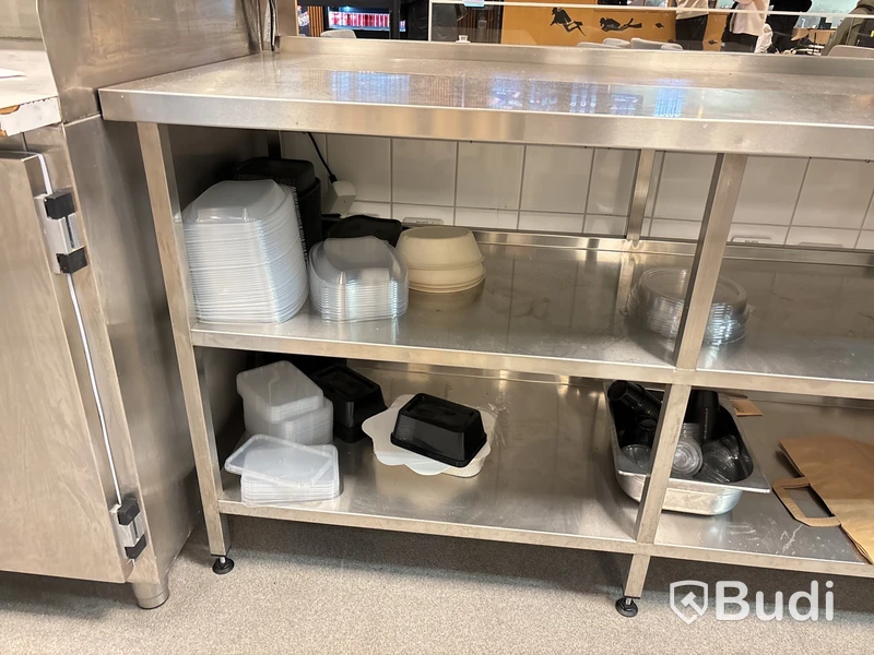 Rostfri arbetsbänk med två underhyllor