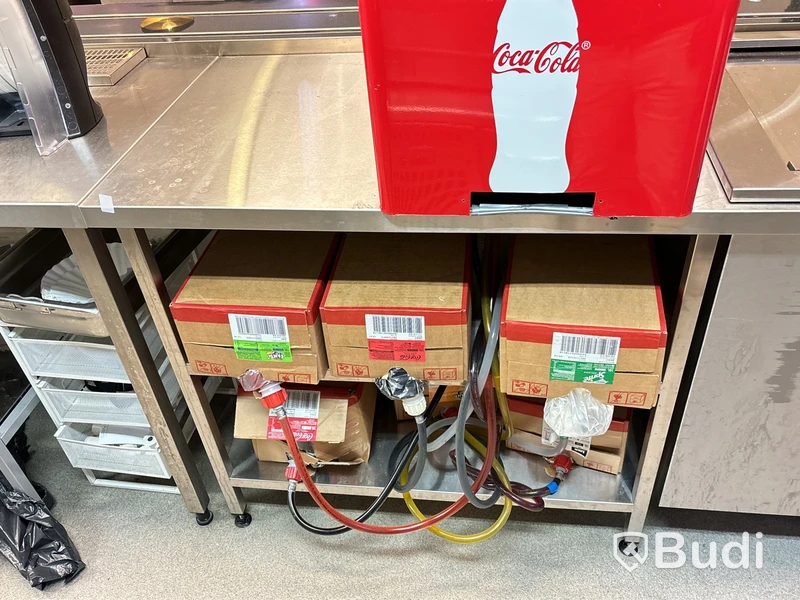 Rostfri arbetsbänk med diskkorgsdispenser
