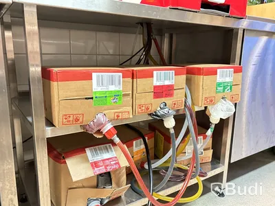 Rostfri arbetsbänk med diskkorgsdispenser