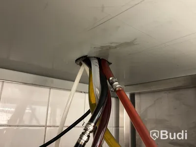 Rostfri arbetsbänk med diskkorgsdispenser