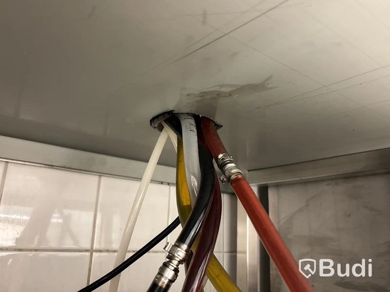 Rostfri arbetsbänk med diskkorgsdispenser