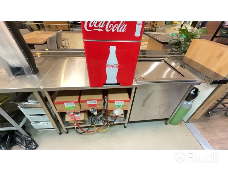 Rostfri arbetsbänk med diskkorgsdispenser