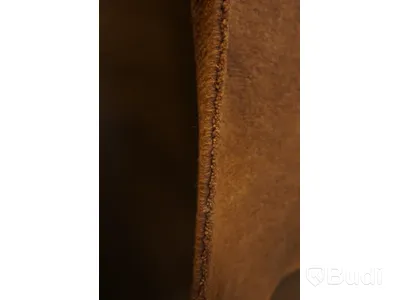 Handknuten matta i en ljusbrun/beige färg, ca 158x82 cm