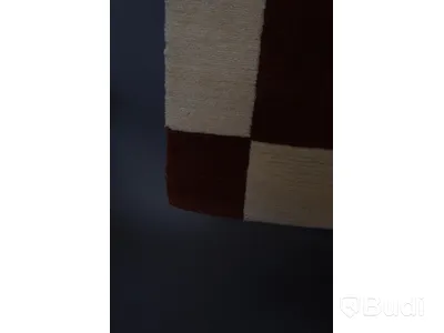 Handknuten matta från Axeco
