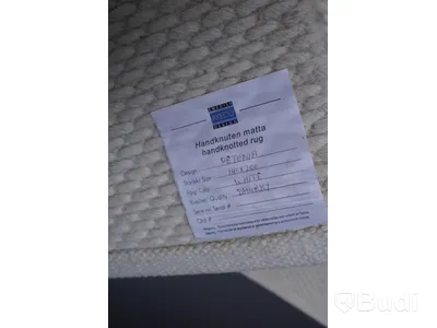 Handknuten matta från AXECO