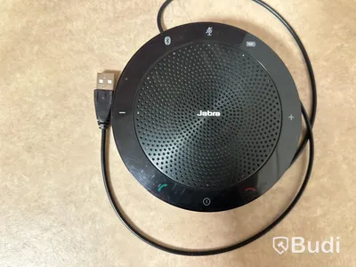 Projektor Benq och högtalare jabra