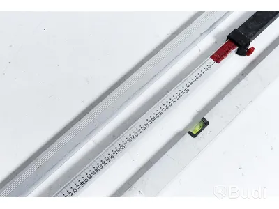 Rotations laser - Spectra Precision LL300, med stativ, Lasermottagare HL450, delbar mätsticka, aluminium rätskiva, lod och mätsticka.