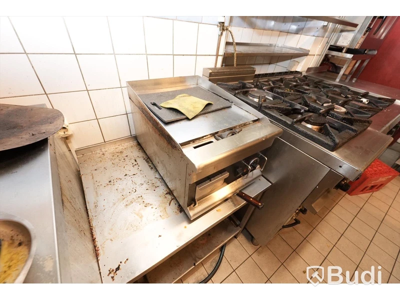 Mindre stekbord samt hylla i rostfritt