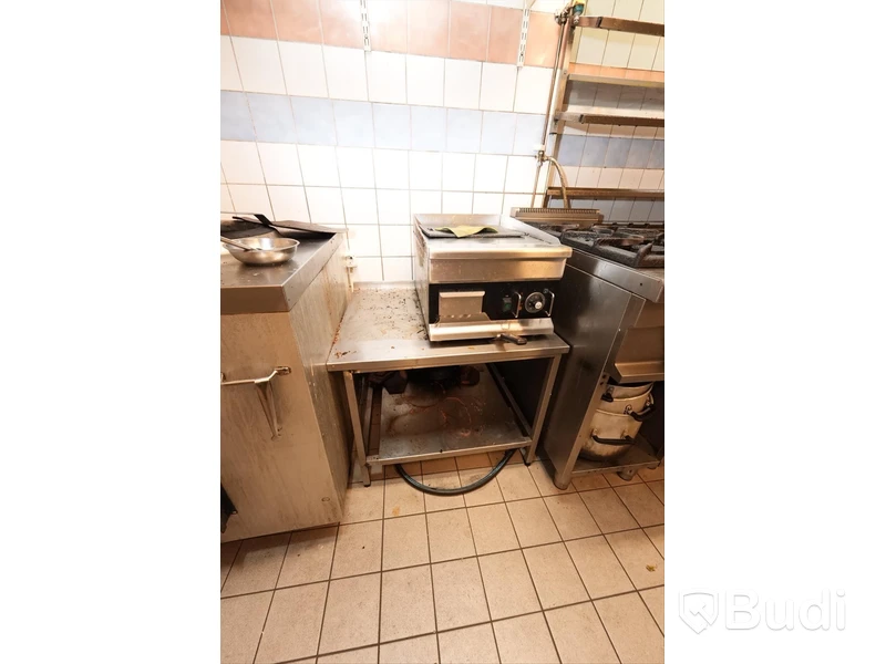 Mindre stekbord samt hylla i rostfritt