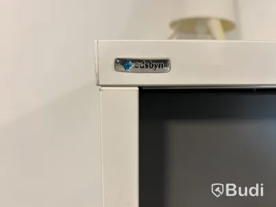 Sittgrupp med bord, fåtöljer, matta samt Edsbyn skåpförvaring