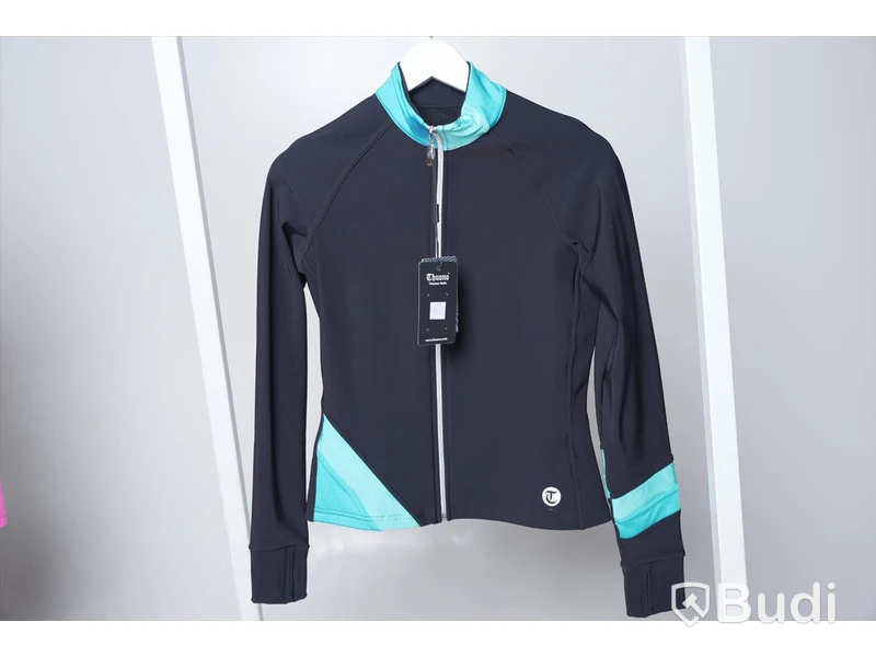 Konståkningsjacka - Thouno (Storlek M, 158cm). Nypris 790kr
