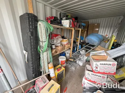 Container 20 fot isolerad med elcentral, belysning samt värmekälla. Fulllastad med byggsaker
