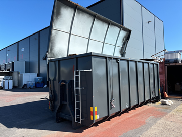 Lastväxlarcontainer med lock