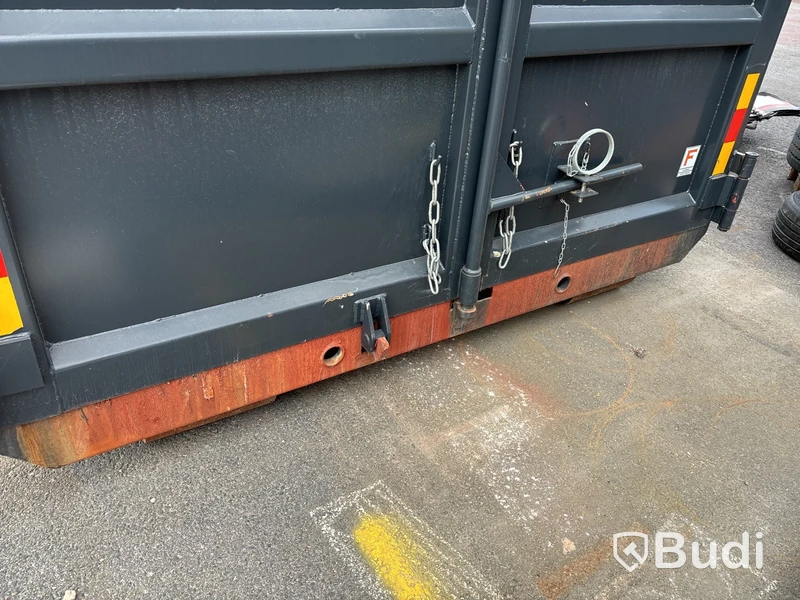 Lastväxlarcontainer med lock