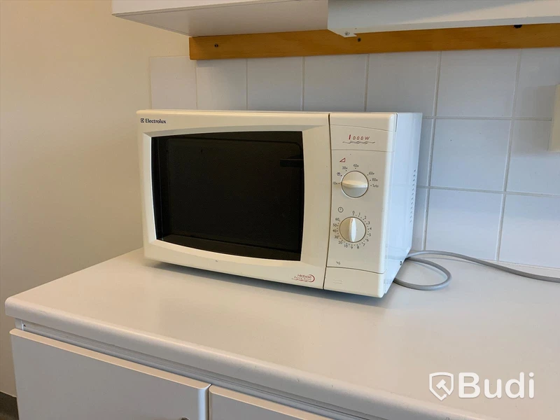 Microvågsugn Electrolux 1000W - Rum 4111