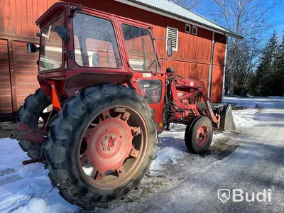 Traktor Volvo BM 430 T med lastarm skopa och gafflar