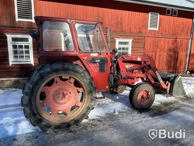 Traktor Volvo BM 430 T med lastarm skopa och gafflar