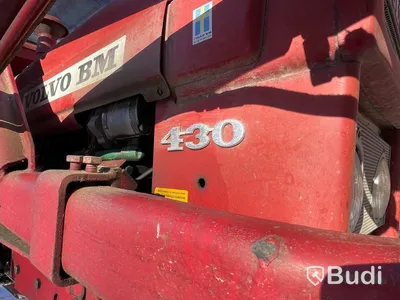 Traktor Volvo BM 430 T med lastarm skopa och gafflar