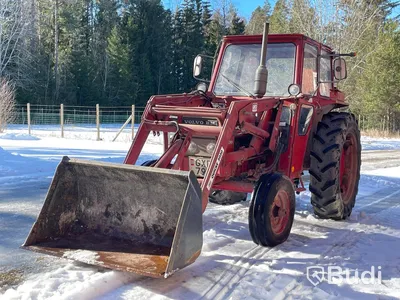 Traktor Volvo BM 430 T med lastarm skopa och gafflar