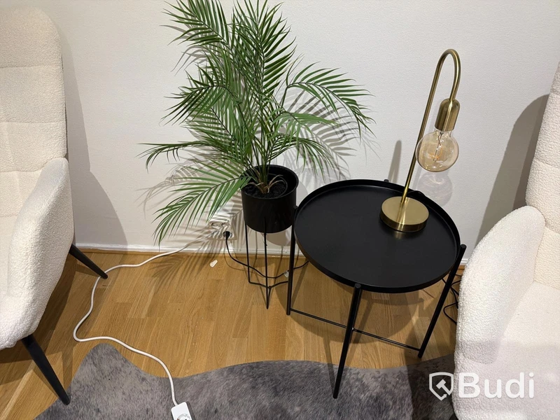 Furniture set with armchairs and stools, table, lamp and artificial plant