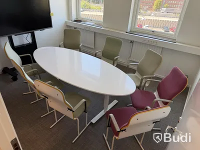 Conference table, 8 conference chairs, Avarte, Yrjö Kukkapuro, light green and cerise/purple, air bubbles in the tabletop