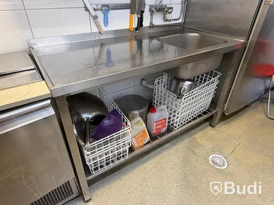 Rostfri arbetsbänk med ho