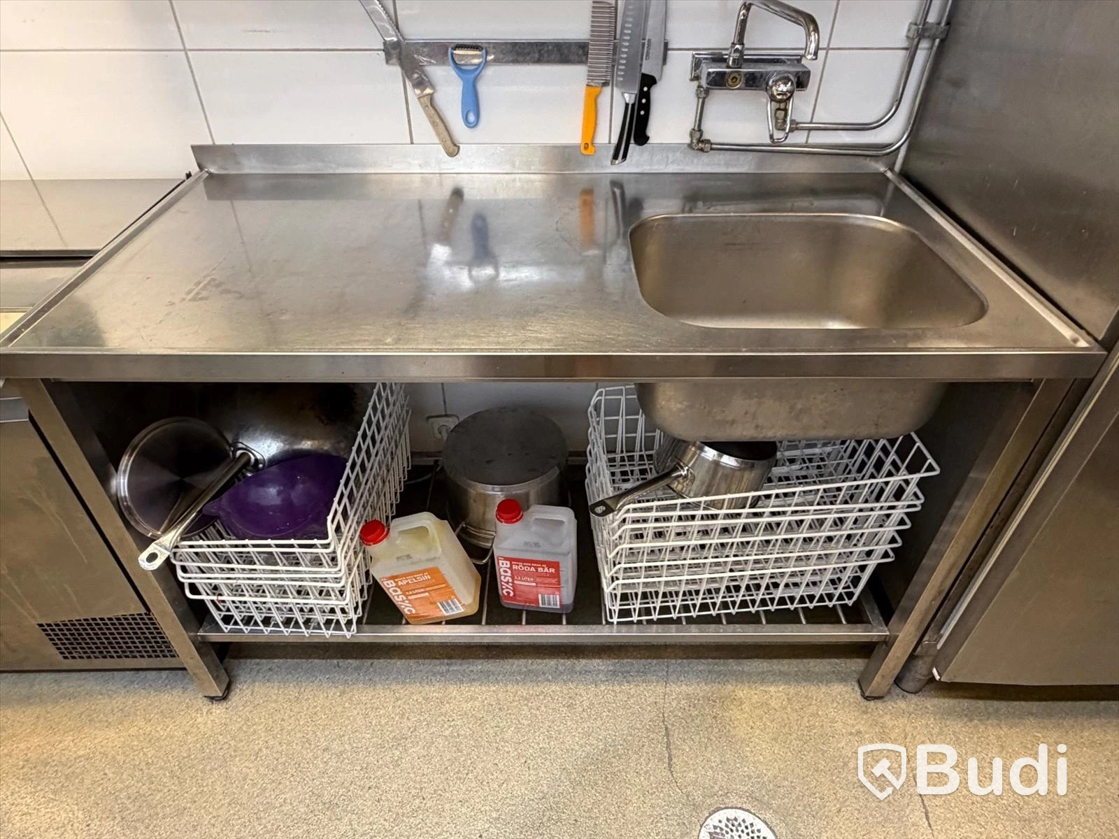 Stainless steel work table with sink