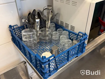 3 stainless steel shelves and a Samsung microwave oven