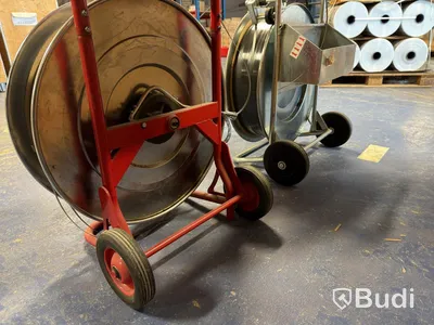 2 pcs. Strapping trolleys with plastic strapping