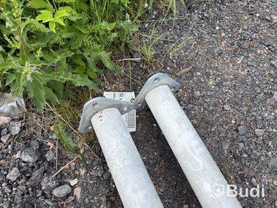 2 flagpoles with foundations