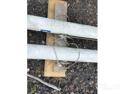 2 flagpoles with foundations