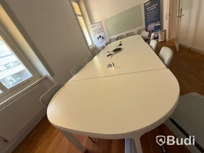 IKEA conference table with 11 designer armchairs: 5 Gärsnäs Day armchairs on castors and 6 Gärsnäs Day armchairs