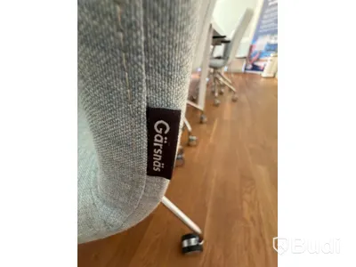 IKEA conference table with 11 designer armchairs: 5 Gärsnäs Day armchairs on castors and 6 Gärsnäs Day armchairs