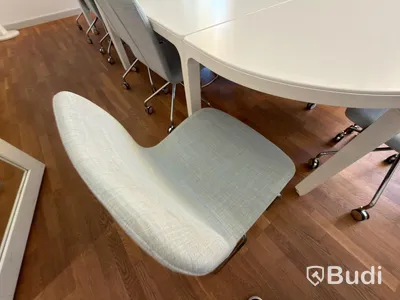IKEA conference table with 11 designer armchairs: 5 Gärsnäs Day armchairs on castors and 6 Gärsnäs Day armchairs