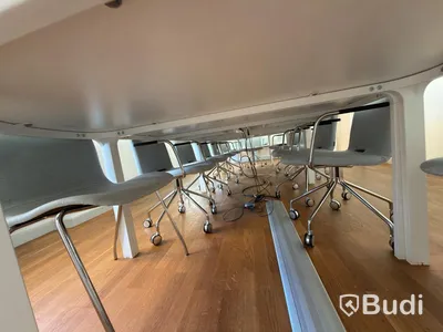 IKEA conference table with 11 designer armchairs: 5 Gärsnäs Day armchairs on castors and 6 Gärsnäs Day armchairs